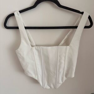 White corset-style crop top